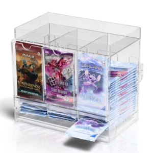 Premium Acrylic Booster Pack Dispenser – 3 Slots Organiseer en presenteer jouw TCG Booster Packs op een professionele manier met de Premium Acrylic Booster Pack Dispenser – 3 Slots. Deze hoogwaardige dispenser is speciaal ontworpen om booster packs overzichtelijk, rechtop en direct toegankelijk te houden, terwijl jouw toonbank, vitrine of display netjes en georganiseerd blijft. Dankzij de drie ruime vakken is de dispenser geschikt voor standaard TCG Booster Packs. De geïntegreerde anti-diefstal slider zorgt voor gecontroleerde uitgifte van de packs, terwijl de magnetische achterdeuren het eenvoudig maken om de dispenser snel bij te vullen. Ideaal voor gebruik in winkels, op evenementen, beurzen of als professionele display tijdens livestreams. Specificaties Afmetingen: 26,2 × 19,4 × 25,5 cm Binnenmaat per vak: 70 × 120 mm Geschikt voor 3 rijen standaard TCG Booster Packs Kristalhelder premium acryl voor een luxe presentatie Geïntegreerde anti-diefstal slider voor gecontroleerde uitgifte Magnetische achterdeuren voor snel en eenvoudig bijvullen Ideaal voor winkels, evenementen, beurzen en streaming-opstellingen